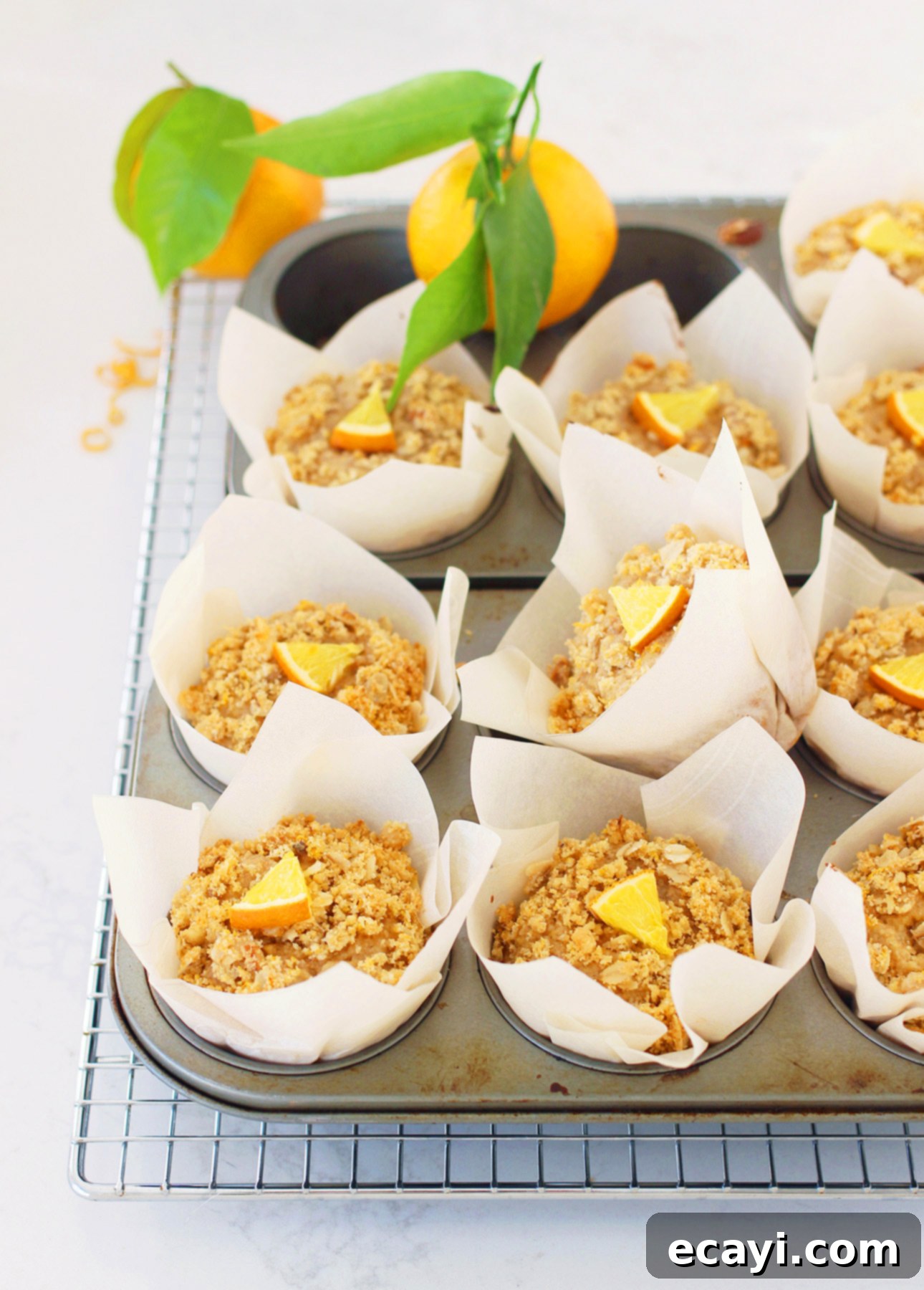 Zesty Whole Orange Maple Oat Muffins 1 featured 11507