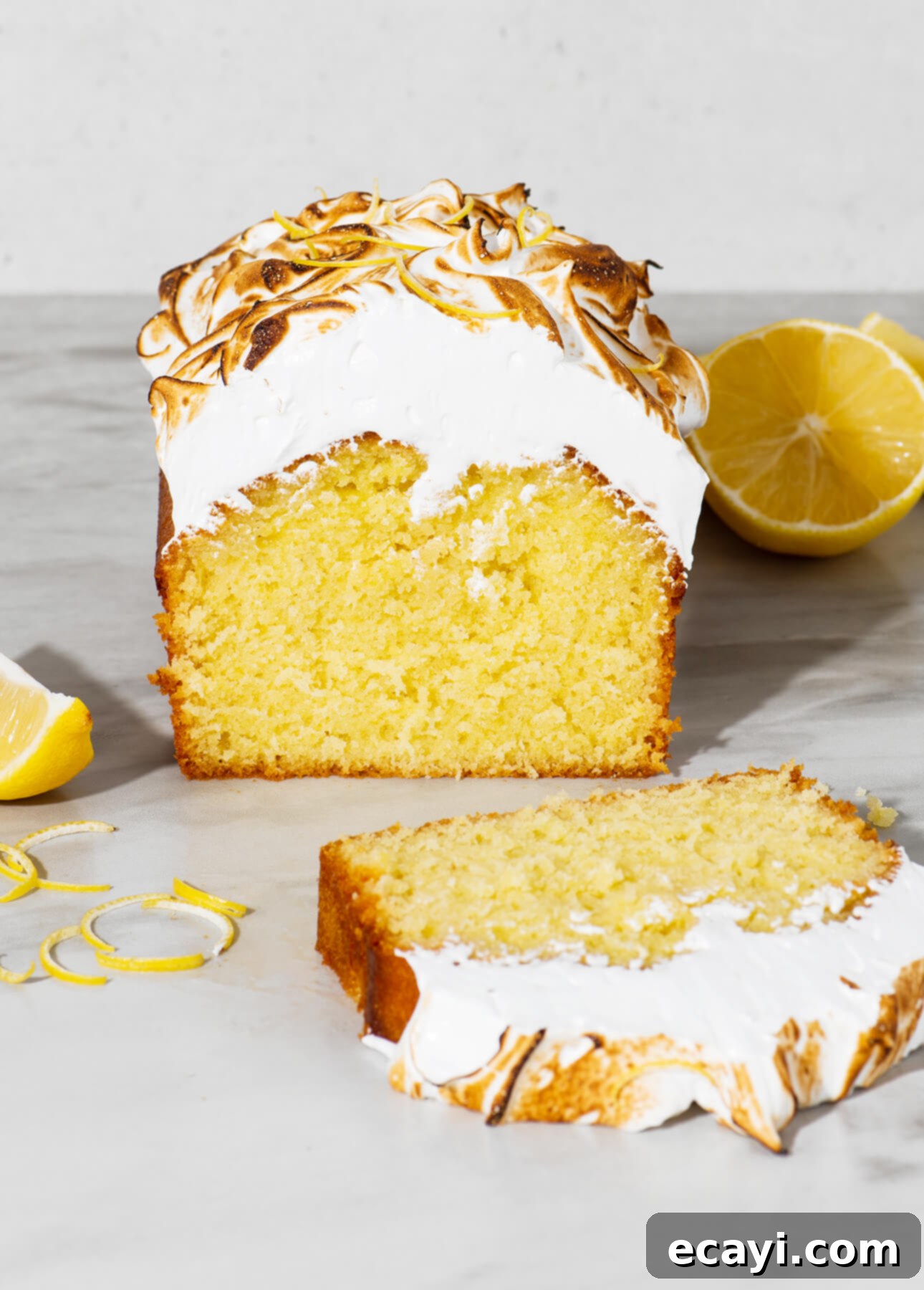 Zesty Olive Oil Cake with Golden Meringue Peaks 1 featured 2266