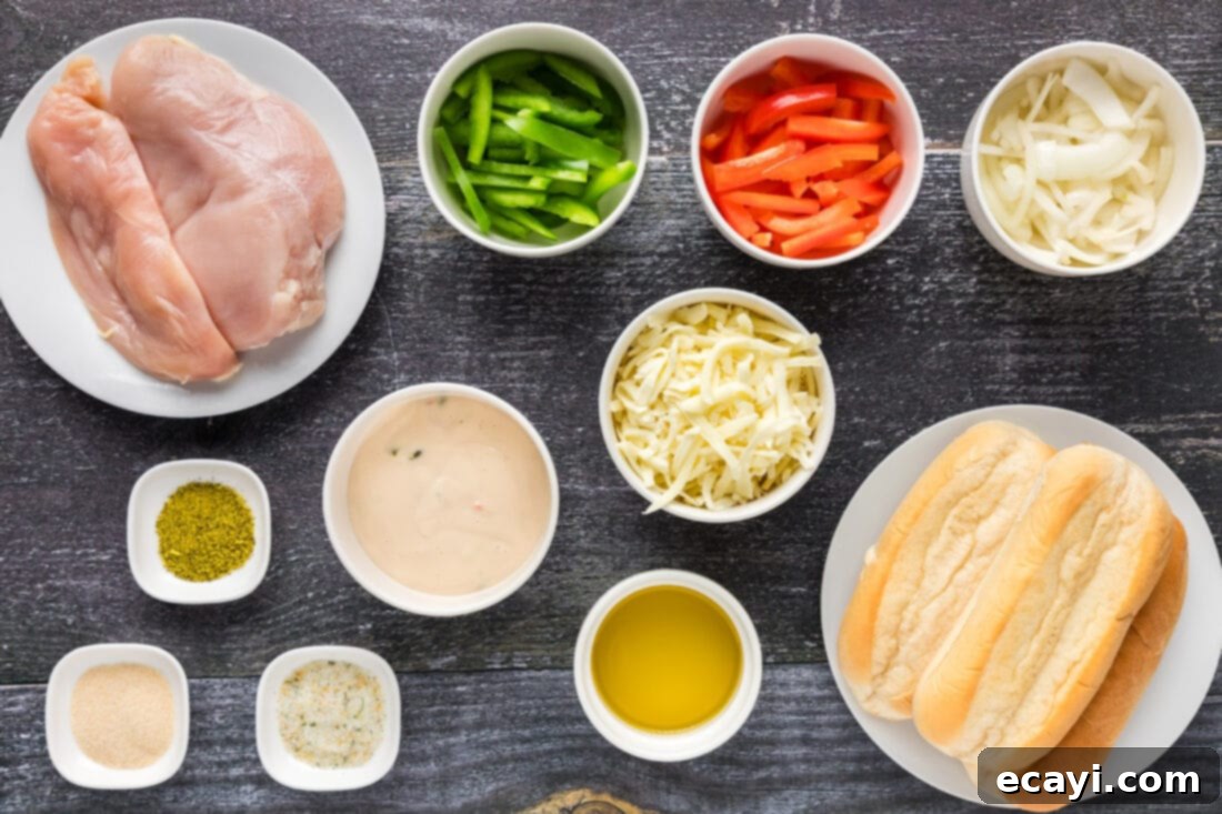 Philly Chicken Cheesesteak 4 An overhead view of all the fresh ingredients needed for Chicken Philly Cheesesteak, neatly arranged on a countertop.