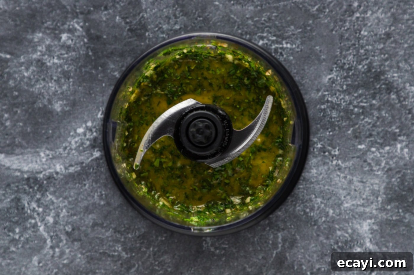 Chimichurri Sauce 6 blitzed chimichurri ingredients in a mini food chopper, showing chunky texture