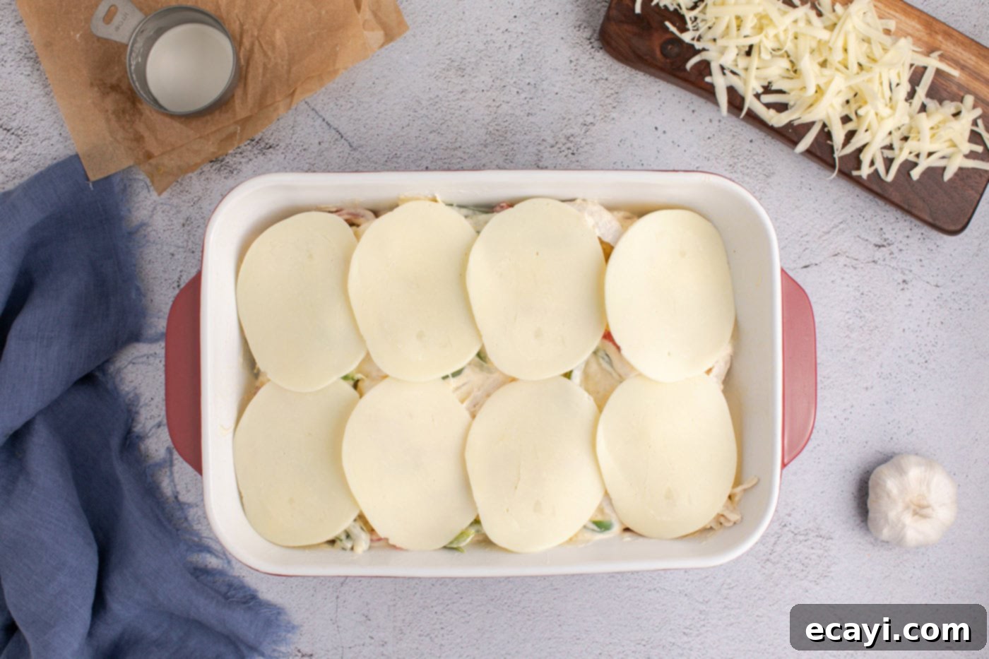 Cheesy Philly Chicken Bake 10 provolone cheese on top of chicken philly cheesesteak casserole