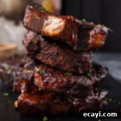 Down-Home Country Ribs 13 Close up photo of Country Style Ribs on a black platter