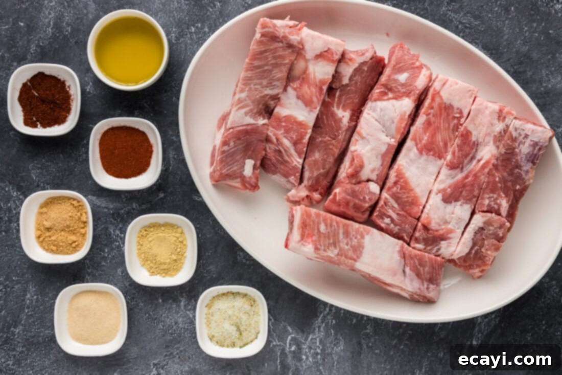 Down-Home Country Ribs 4 A selection of ingredients for Country Style Ribs, including spices and pork.