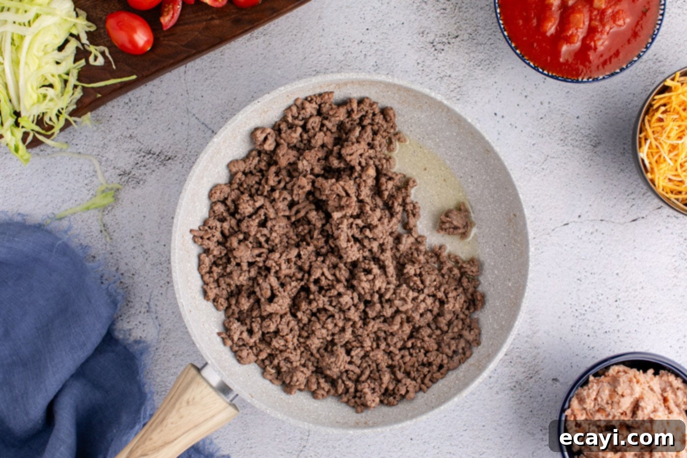 Fiesta Taco Pizza 5 Ground beef being cooked in a skillet for the taco pizza base.