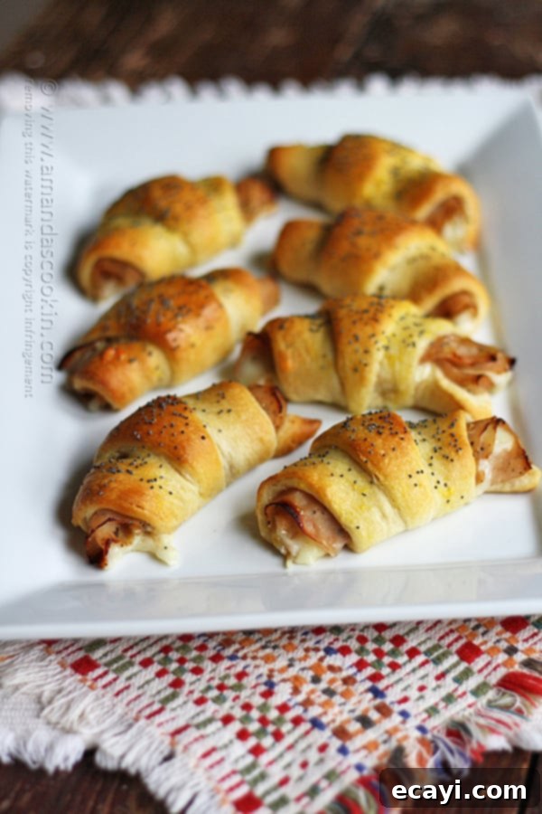 Quick, delicious Turkey Pepper Jack Roll Ups are perfect for holidays, game day, or any party. Turkey Pepper Jack Roll Ups on platter, ready to serve