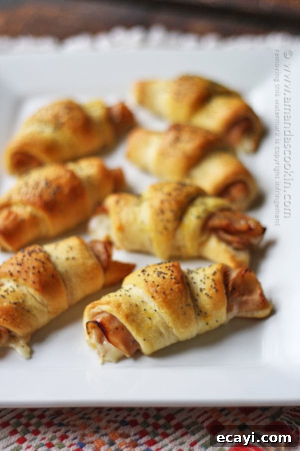 Turkey Pepper Jack Roll Ups are easy to make ahead for holidays, game day, or any occasion. Turkey Pepper Jack Roll Ups arranged neatly