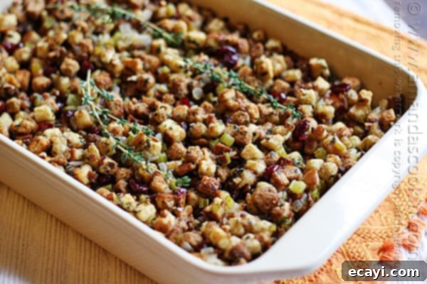 Aromatic Herb Stuffing 3 A close up of a pan of stuffing with parsley, sage, rosemary and thyme.