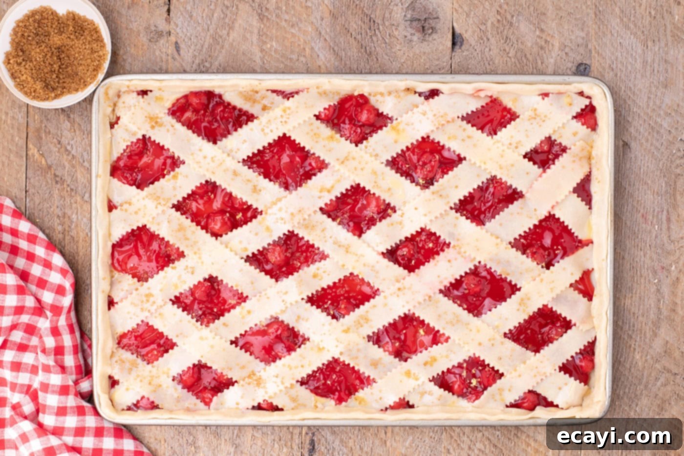 Sheet Pan Cherry Pie 16 turbinado sugar sprinkled over slab pie