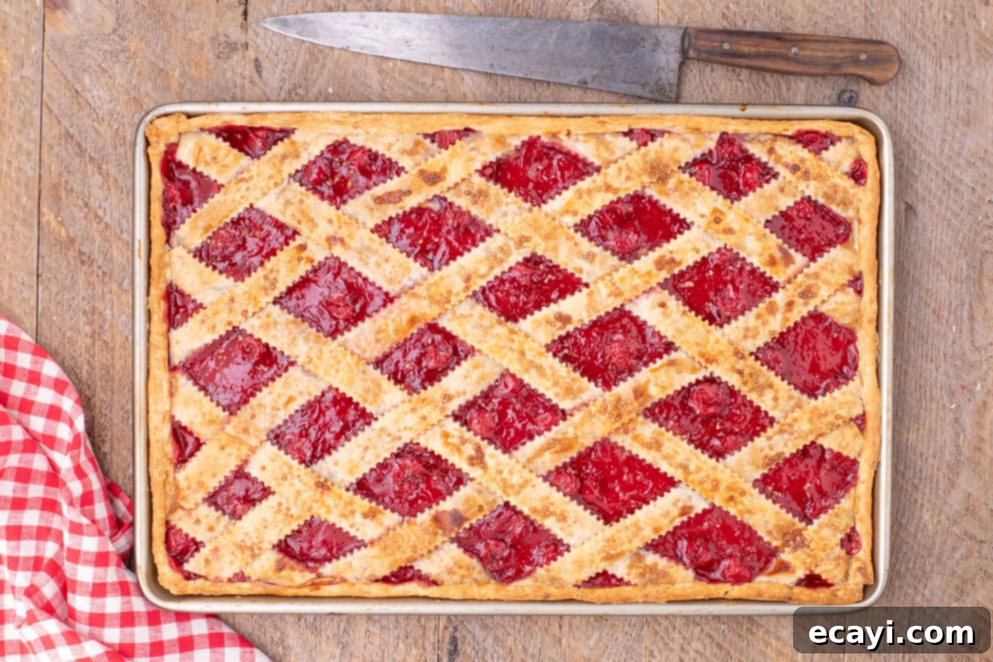 Sheet Pan Cherry Pie 17 overhead of baked cherry slab pie in jelly roll pan