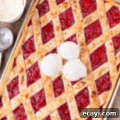 Sheet Pan Cherry Pie 19 Cherry Slab Pie topped with three scoops of ice cream