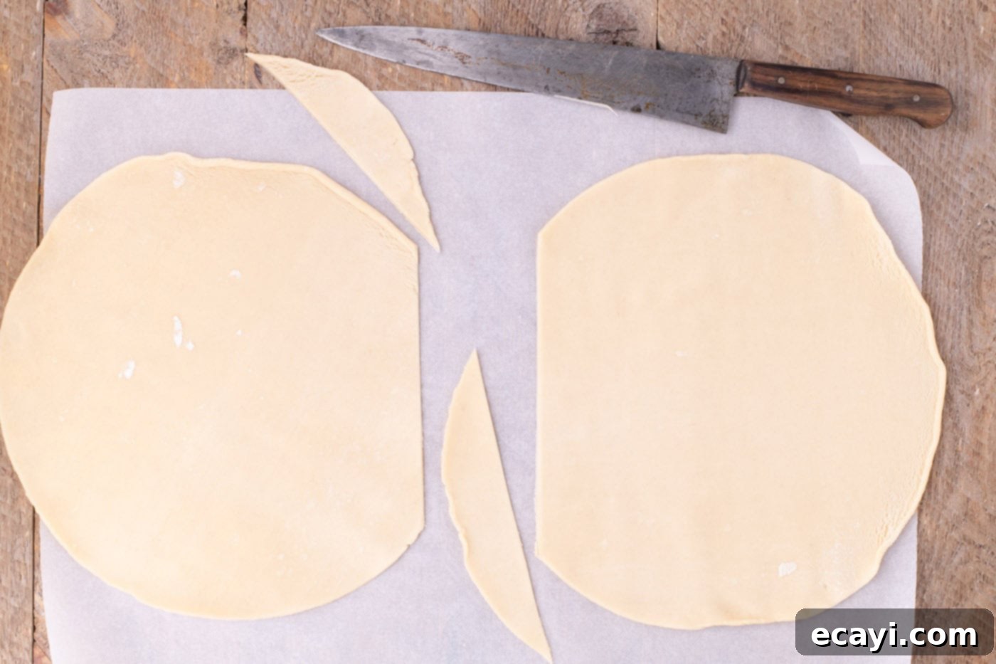 Sheet Pan Cherry Pie 5 trimmed premade pie crust on parchment paper