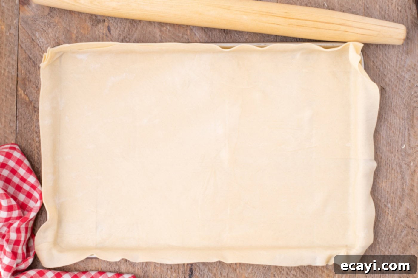 Sheet Pan Cherry Pie 8 pie crust placed in a jelly roll pan