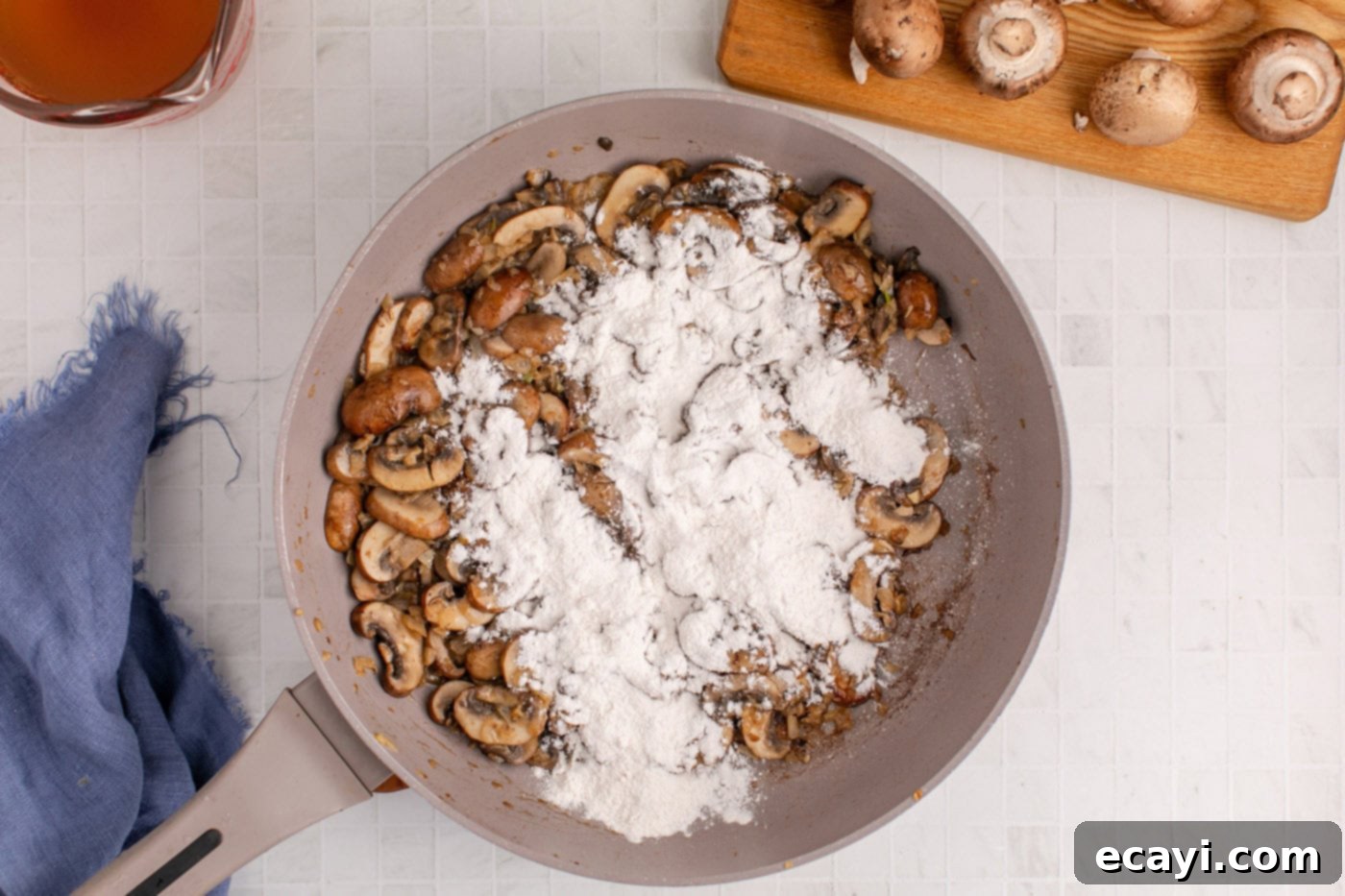Hearty Salisbury Steak Meatballs 11 flour added to the skillet with sauteed onion and mushrooms, forming a roux