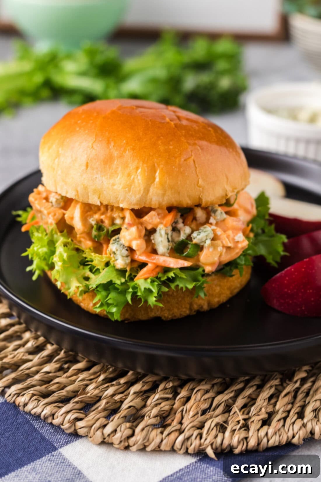 Fiery Buffalo Chicken Bowl 9 Buffalo Chicken Salad served on a soft hamburger bun with blue cheese crumbles