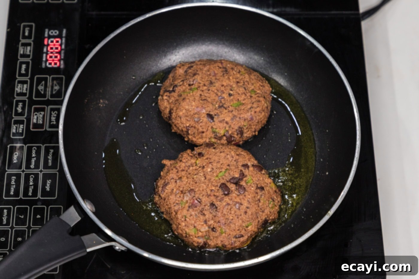 Signature Black Bean Burger 11 black bean burgers in a skillet