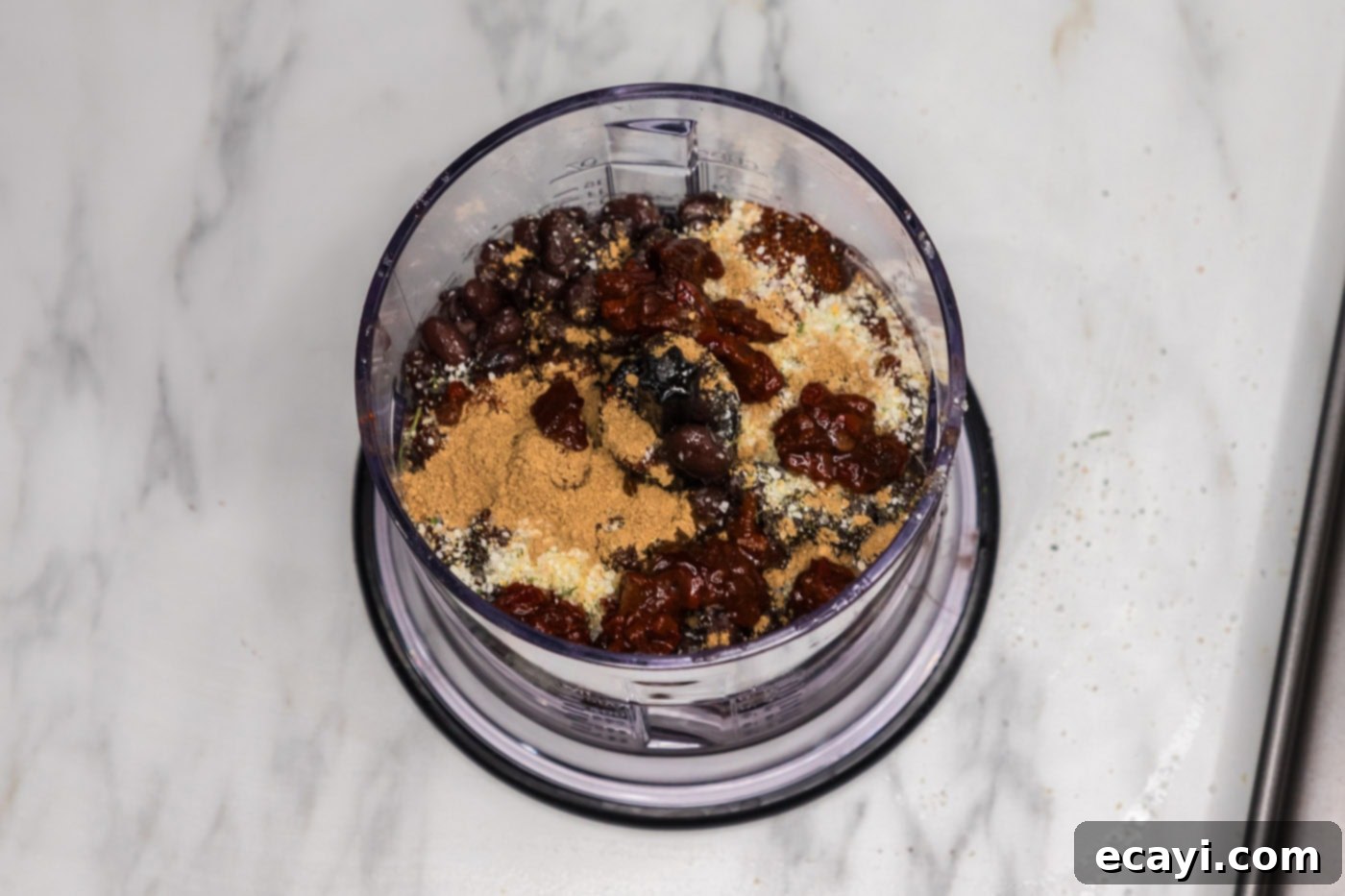 Signature Black Bean Burger 6 black beans in a food processor with seasonings, chipotle peppers, and soy sauce