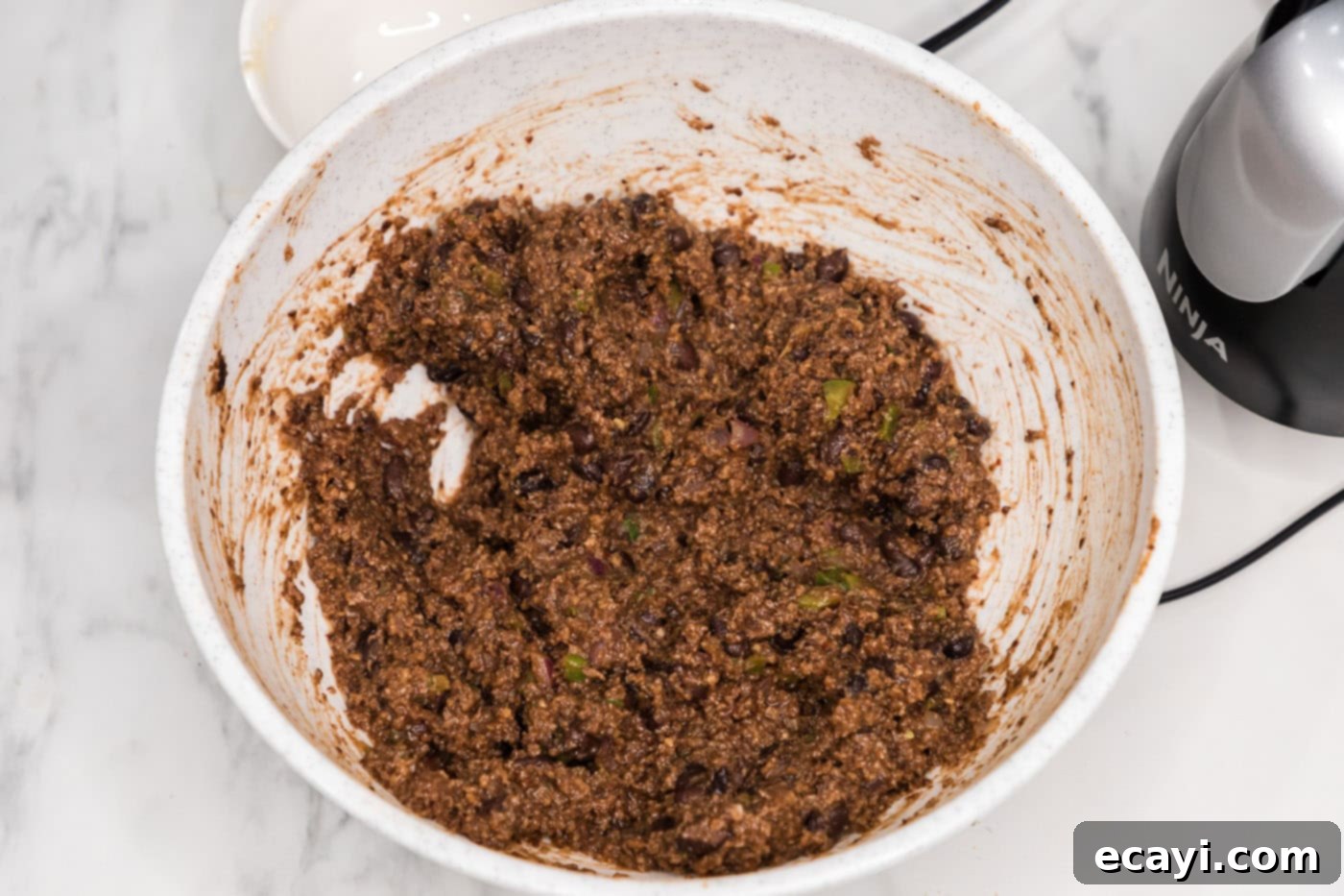 Signature Black Bean Burger 9 black bean burger mixture in a mixing bowl