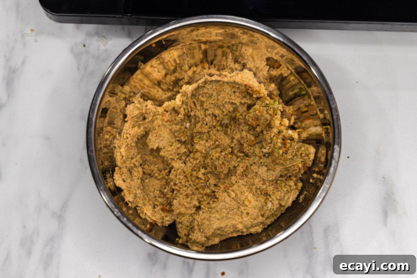 Plant-Based Burgers 11 veggie burger mixture in a mixing bowl