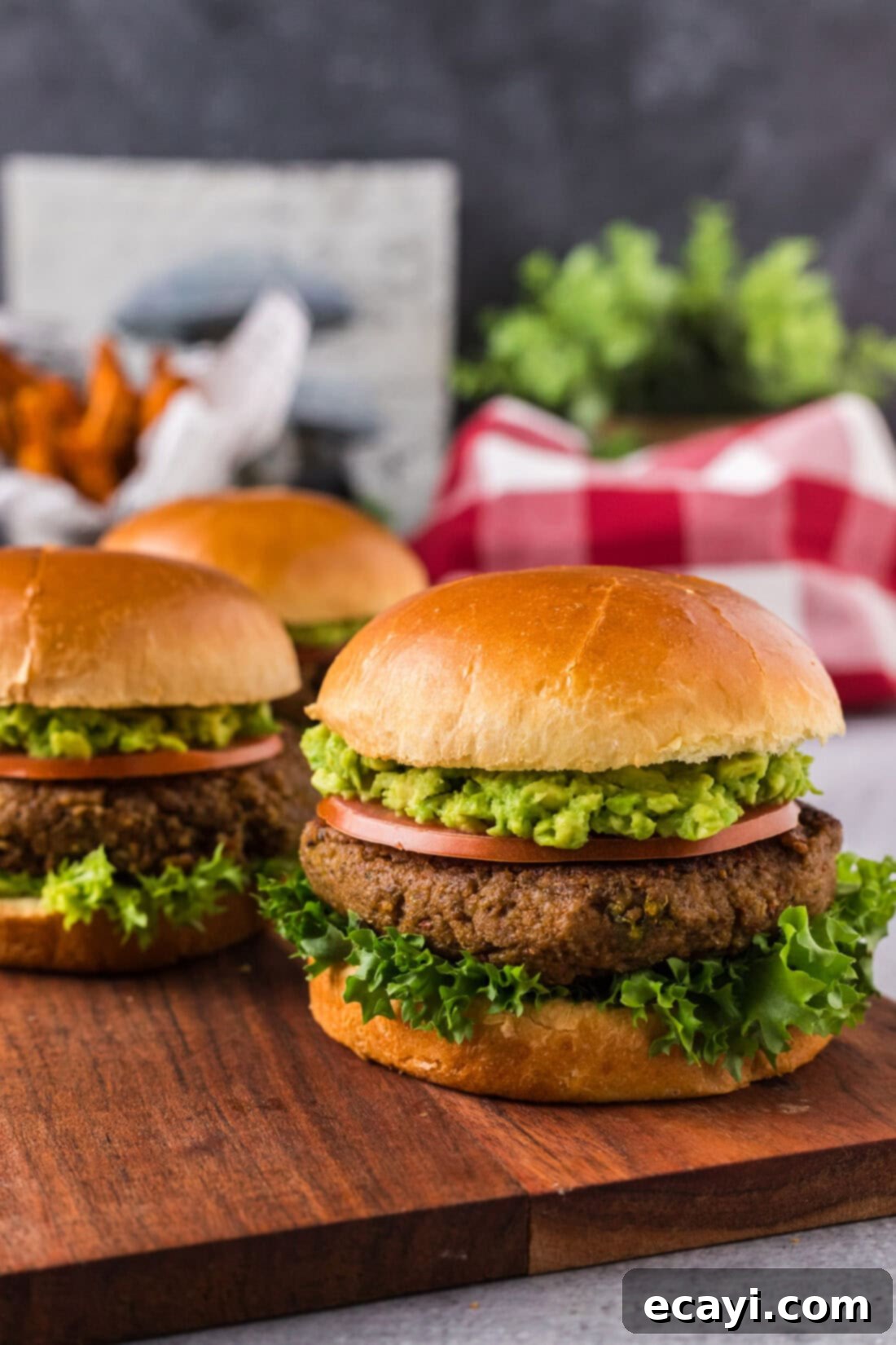 Plant-Based Burgers 14 Three Veggie Burgers on a wooden serving platter
