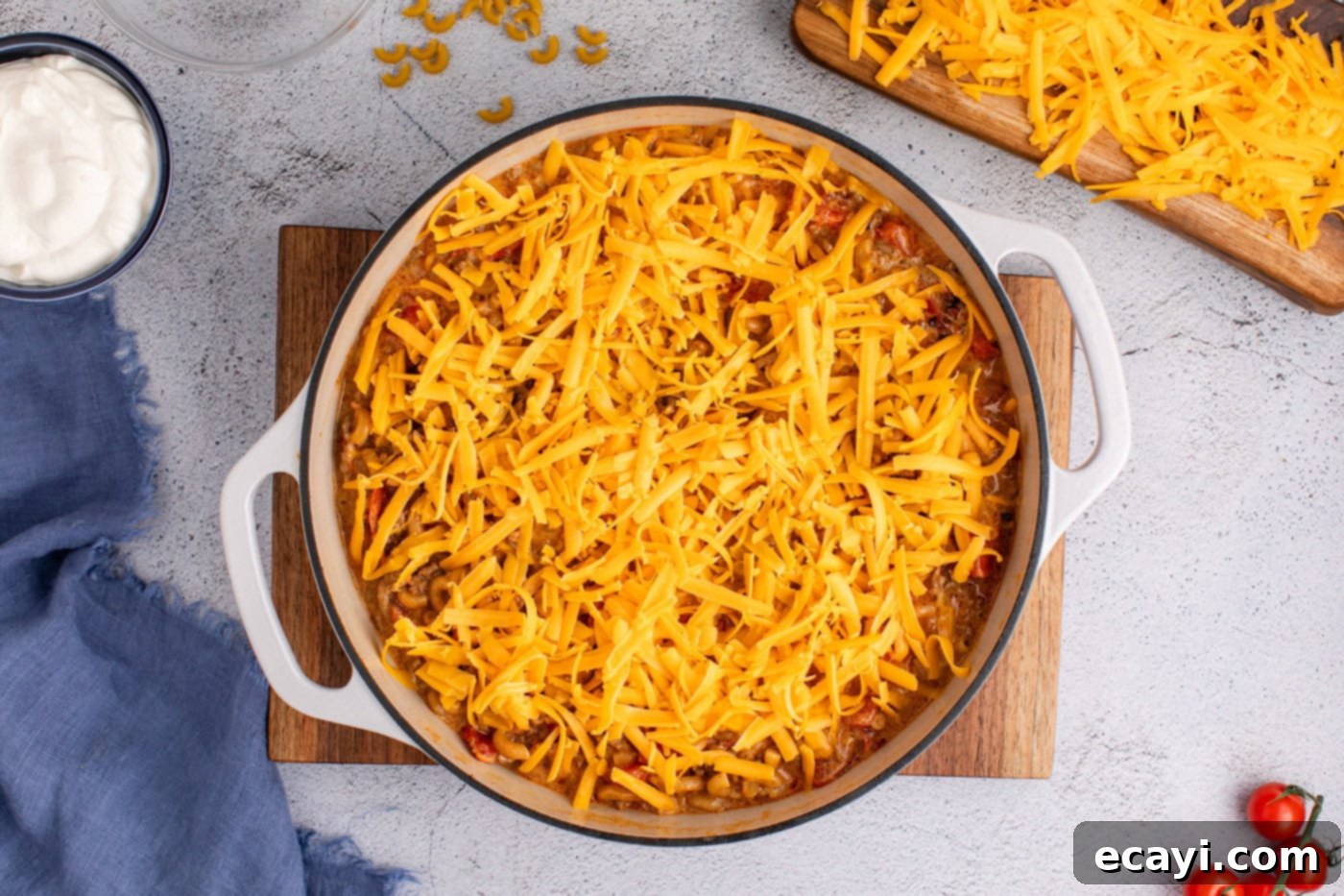 Taco Mac 'n' Cheese 10 shredded cheddar cheese generously sprinkled on top of the warm taco mac.