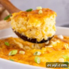 Creamy Golden Corn Bake 12 Close up photo of a scoop of Corn Pudding, highlighting its creamy texture and golden crust