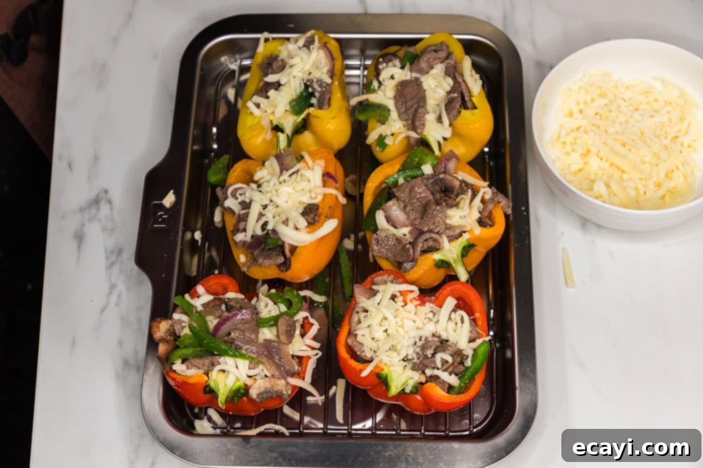 Loaded Philly Cheesesteak Peppers 7 steak and onion mixture added on top of sliced bell peppers with cheese