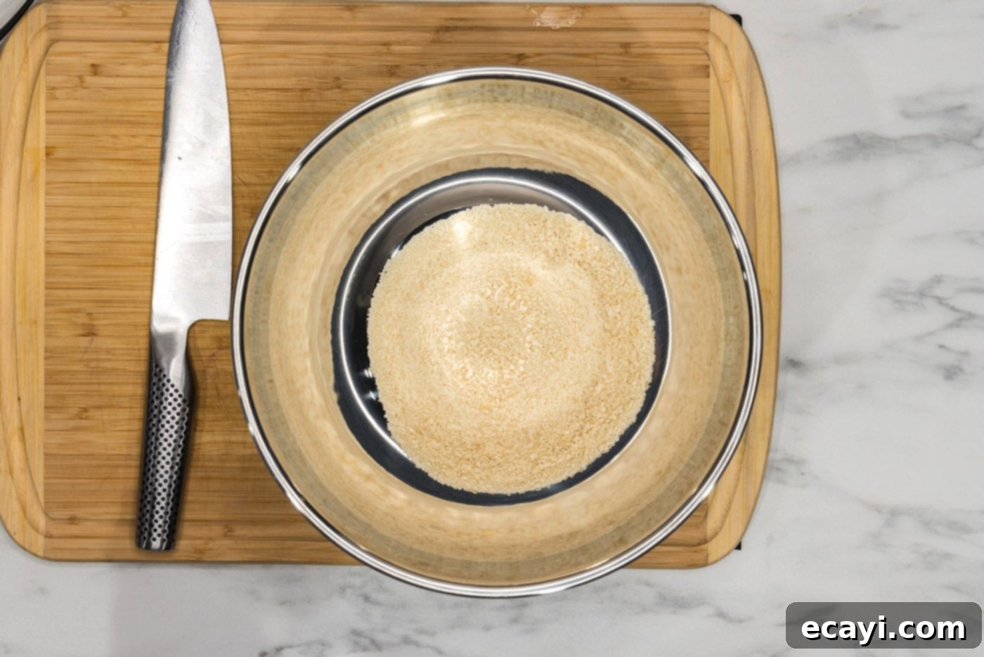 Zesty Shrimp Burger 5 Finely blended panko breadcrumbs in a mixing bowl, ready for coating.