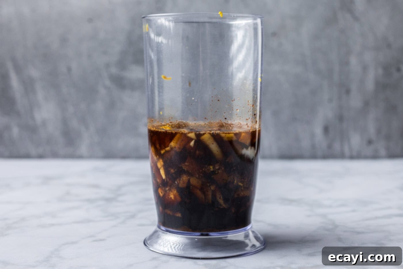 Signature Bourbon Marinade 5 brown sugar bourbon marinade ingredients in an immersion blender