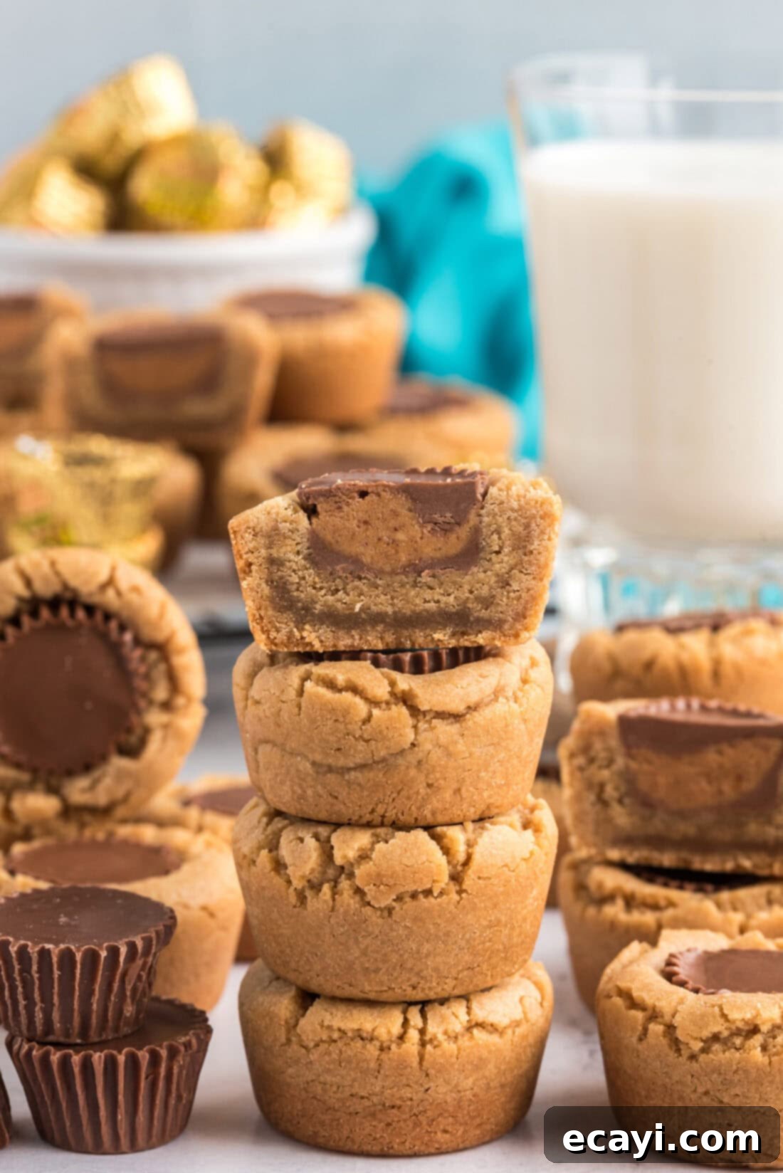 Reese's Peanut Butter Cup Stuffed Cookies 3 Stack of Reese’s Peanut Butter Cup Cookies with the top cookie cut in half