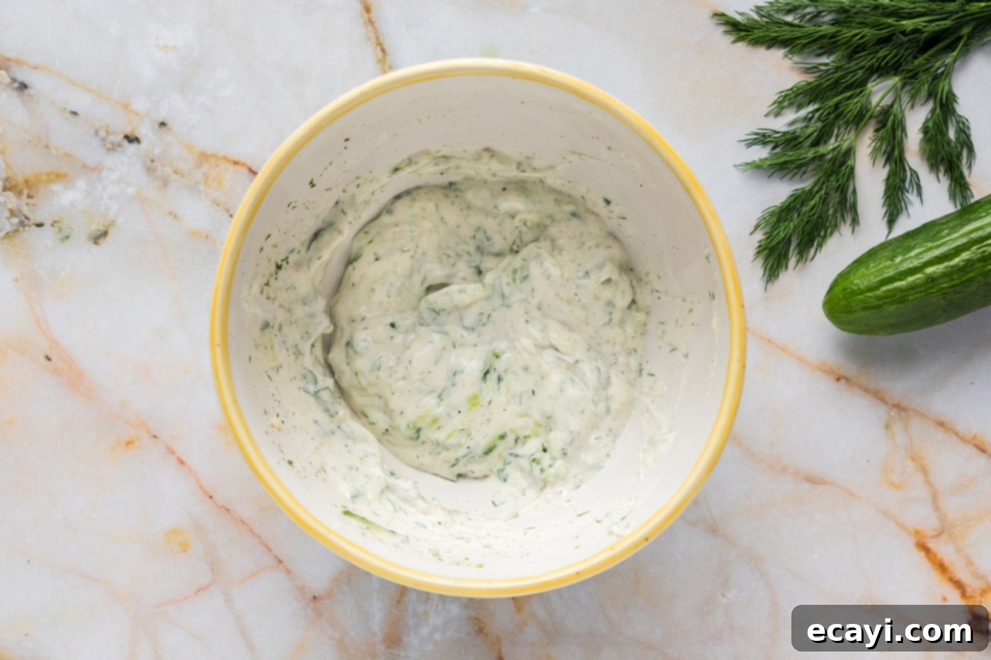 Classic Tzatziki Dip 8 tzatziki sauce combined in a mixing bowl