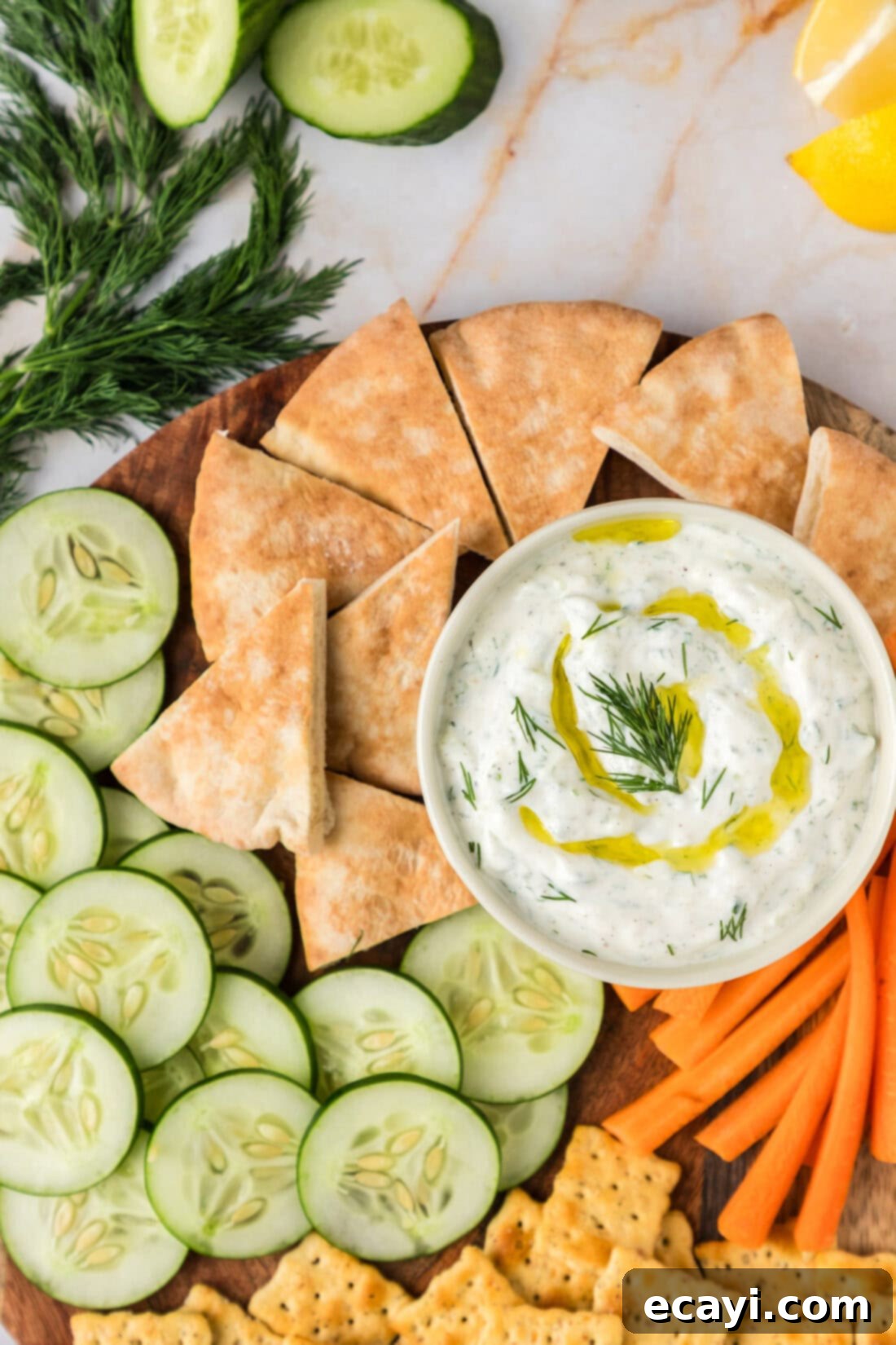 Classic Tzatziki Dip 9 Close up photo of a bowl of Tzatziki Sauce topped with olive oil