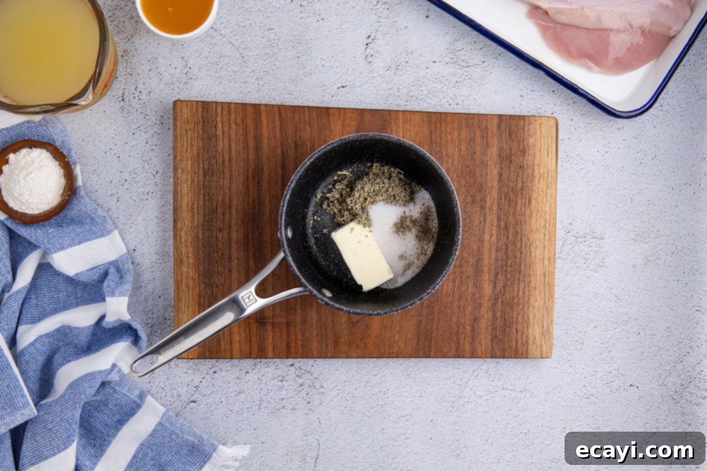 Perfectly Tender Crockpot Turkey Breast 6 Small saucepan containing solid butter and spices before melting.