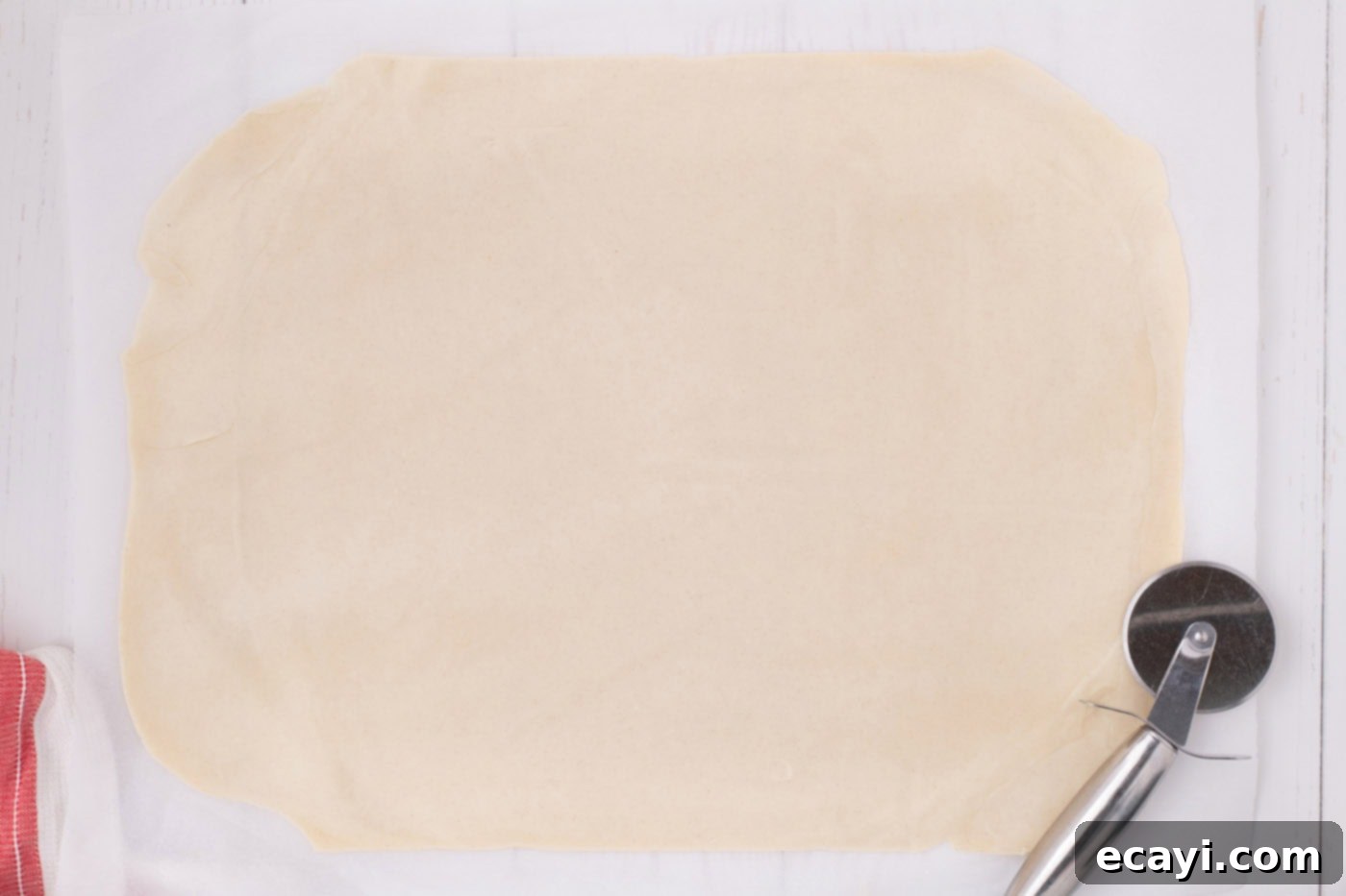 Sheet Pan Apple Pie 8 pie dough rolled out into a rectangle