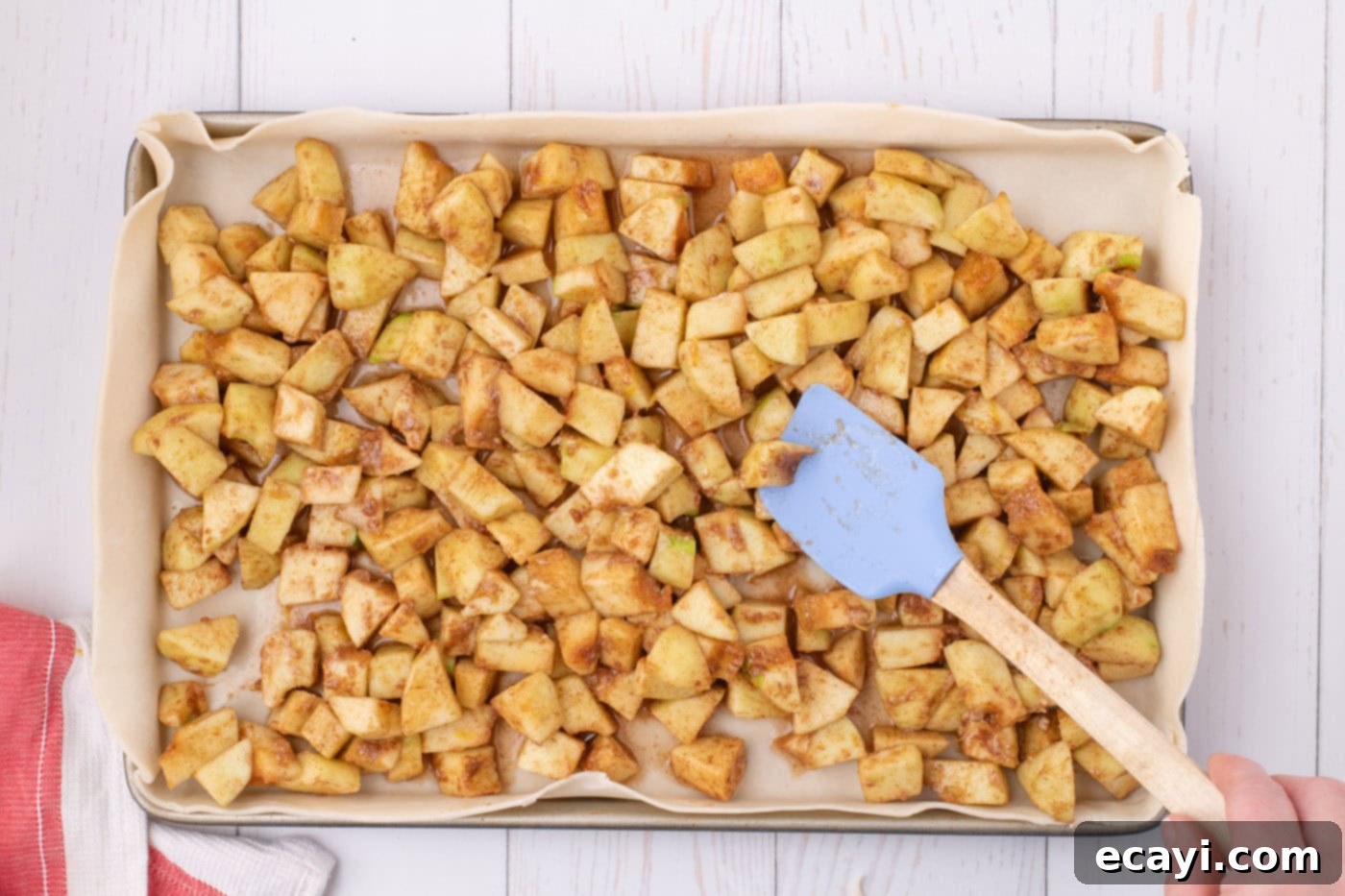 Sheet Pan Apple Pie 9 chopped apples added to pie dough in a sheet pan