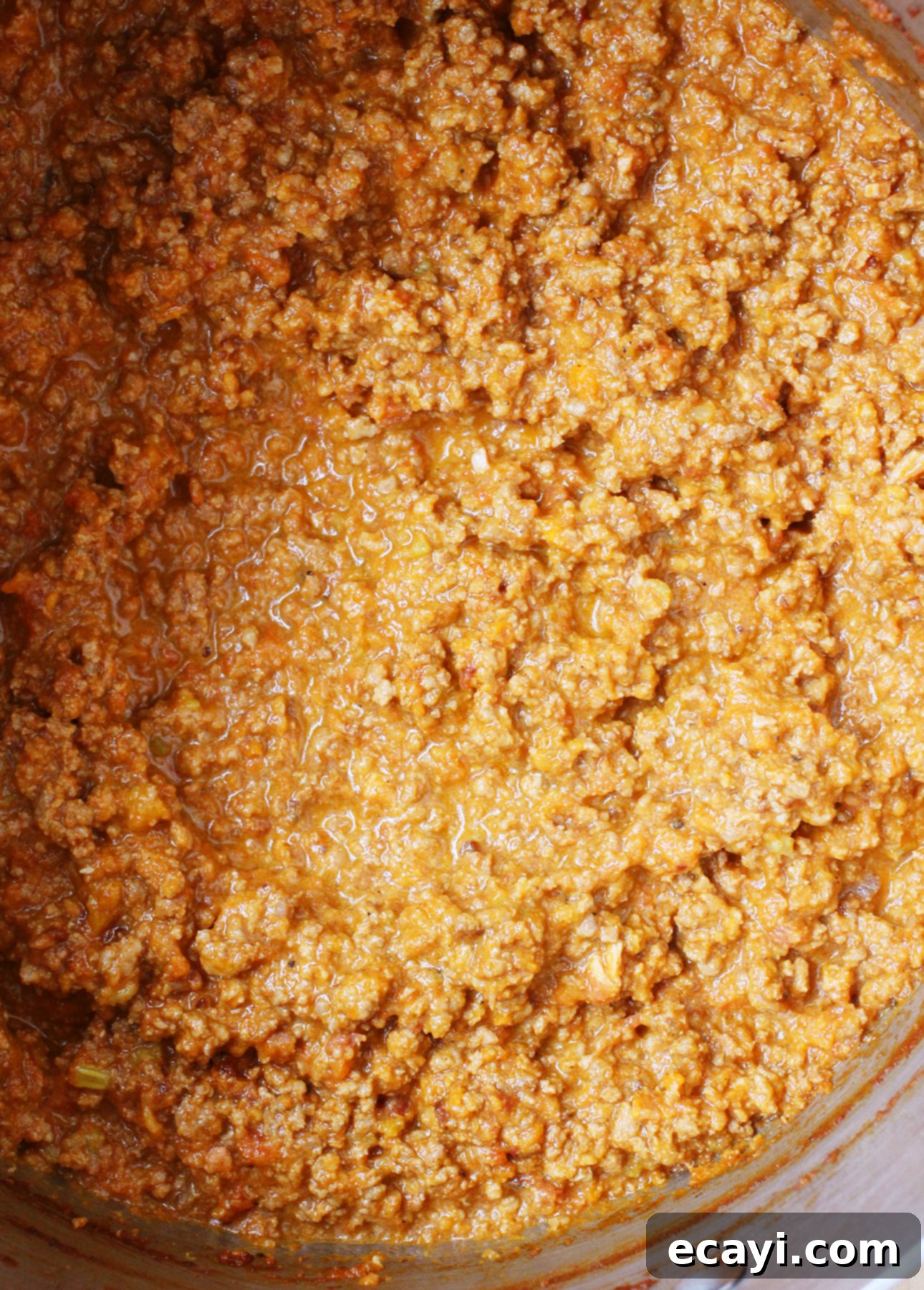Master Authentic Bolognese Sauce 13 Thick, rich, and creamy Italian Bolognese Sauce simmering to perfection in a pot
