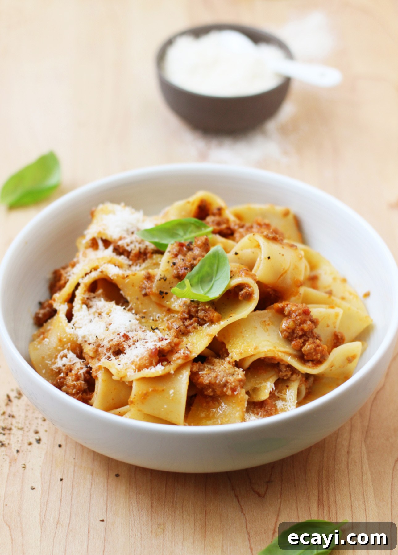 Master Authentic Bolognese Sauce 9 A serving bowl of Pappardelle al Ragù Bolognese, featuring wide pasta generously coated with authentic Italian Bolognese Sauce