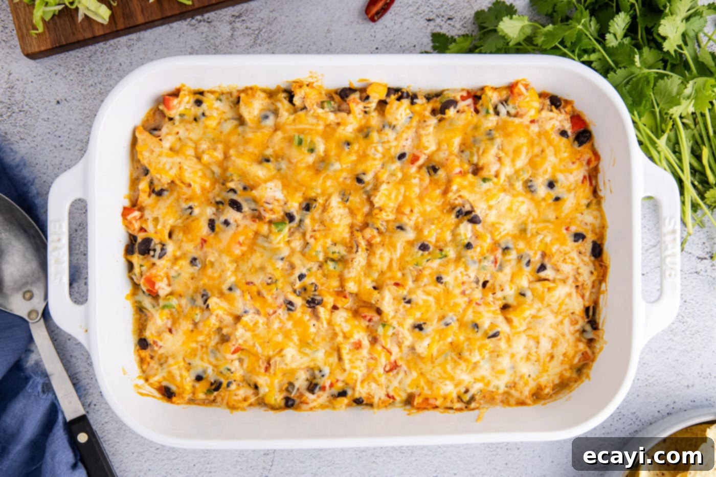 Cheesy Chicken Taco Casserole 10 overhead shot of a fully baked chicken taco casserole, with melted cheese and a golden crust.