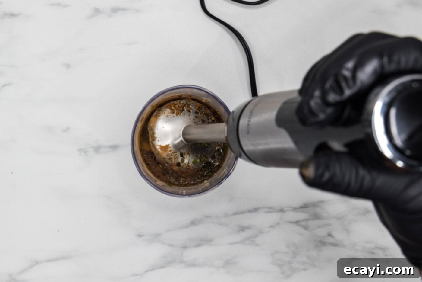 Caribbean Jerk Chicken 5 blitzing jerk chicken marinade ingredients in an immersion blender