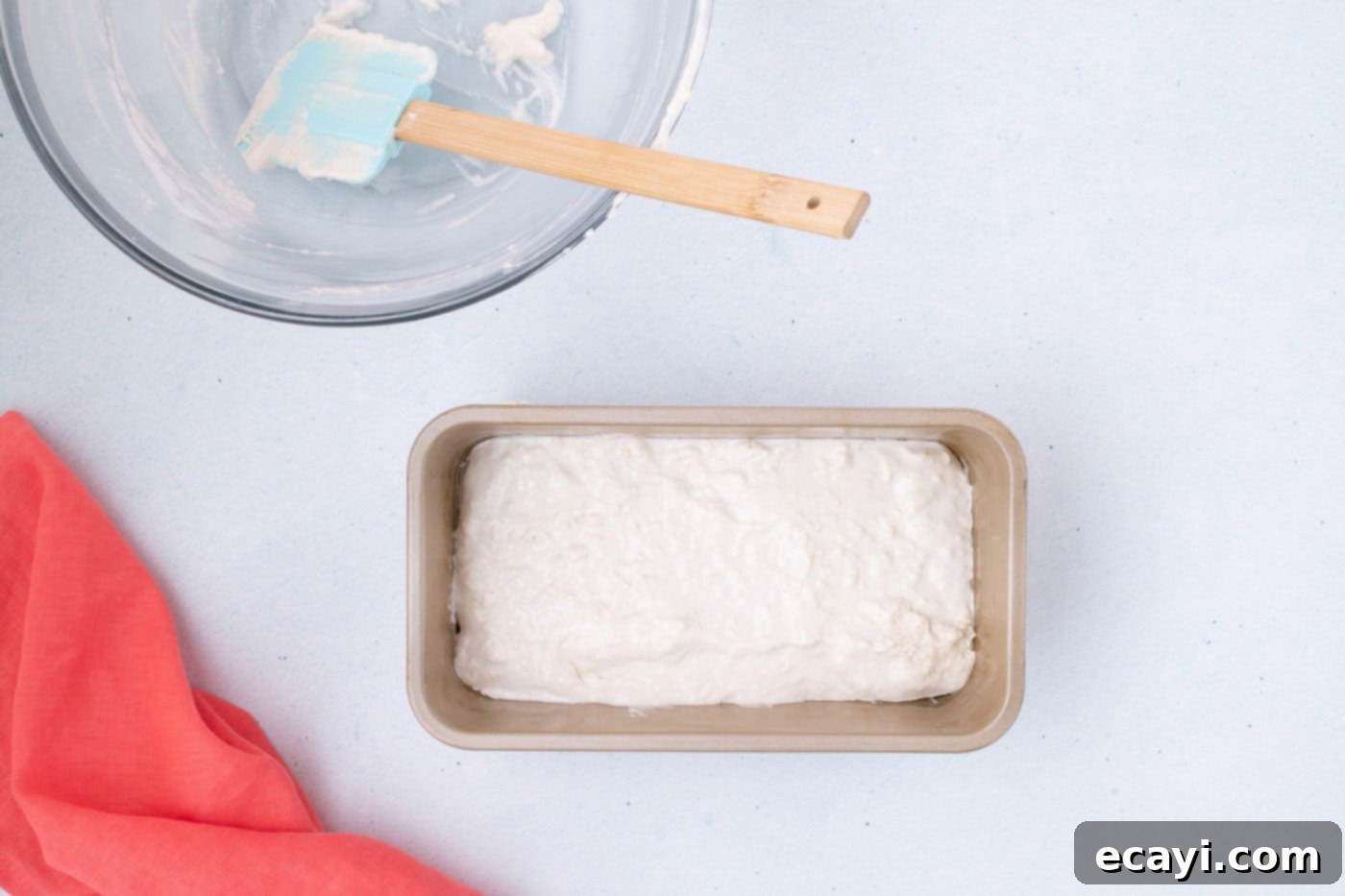 2-Ingredient Ice Cream Bread 8 Ice cream bread batter evenly spread into a loaf pan, ready for baking.
