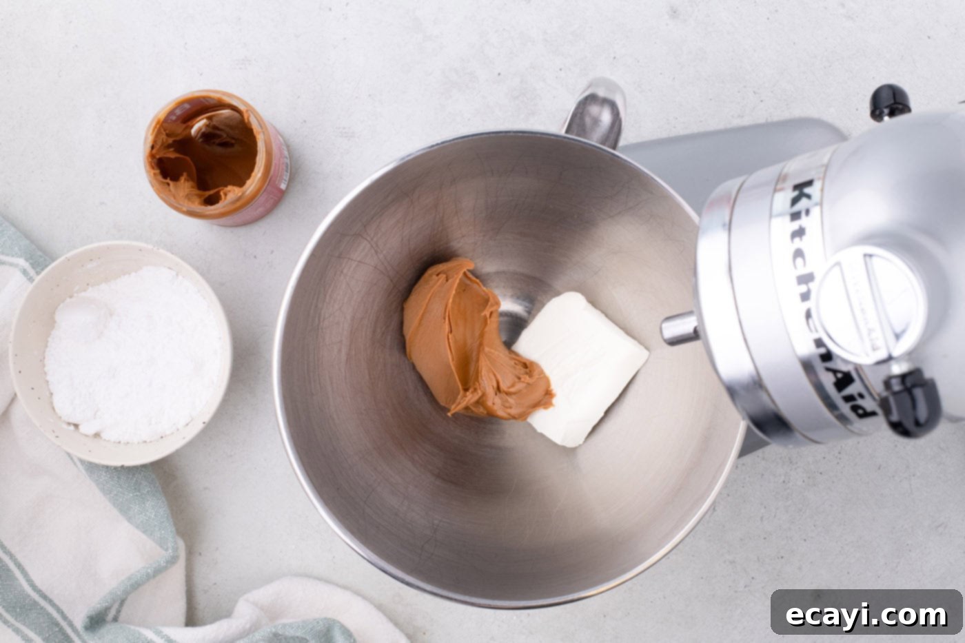 No-Bake Biscoff Bliss 5 cookie butter and cream cheese in a stand mixer bowl