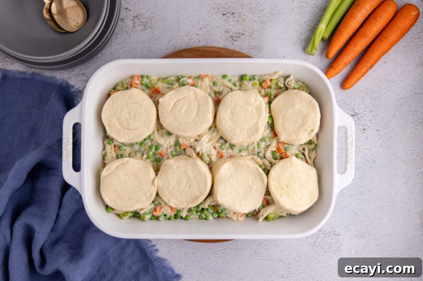 Hearty Chicken Pot Pie Casserole 11 chicken pot pie topped with biscuits in a casserole dish