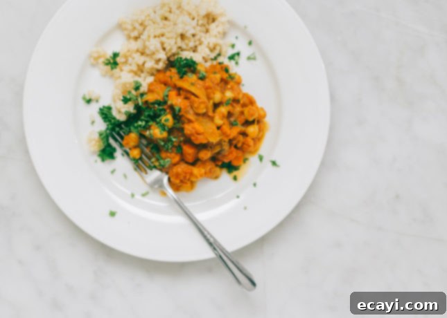 Perfect Pantry Chana Masala and Brown Rice 3 A beautifully presented bowl of Pantry Chana Masala with Brown Rice, a simple and satisfying vegetarian meal by Yummy Beet's Allison Day.