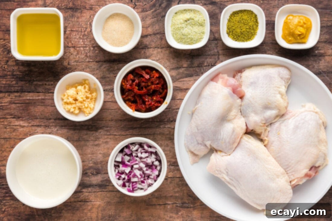 Crispy Skillet Chicken Thighs 4 Ingredients for Skillet Chicken Thighs laid out on a counter