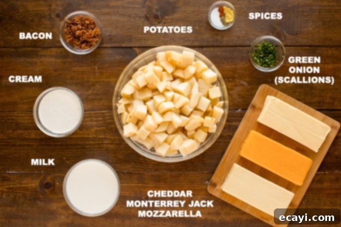 Cheddar, Monterey jack and smoked mozzarella come together in this delicious three cheese potatoes dish. Perfect to serve a crowd or to bring to a potluck. A vibrant display of fresh ingredients laid out on a wooden cutting board, including peeled and diced Russet potatoes, blocks of cheddar, Monterey Jack, and smoked mozzarella cheese, a bottle of milk, cream, and various spices.