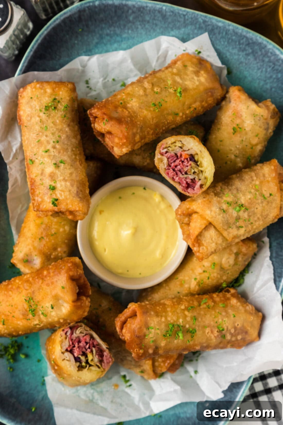Crispy Corned Beef Egg Rolls 14 Platter of Corned Beef Egg Rolls with one cut in half