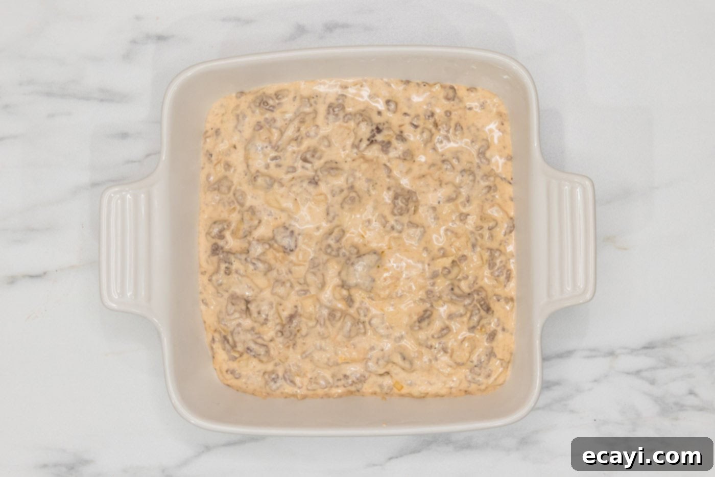 Loaded Cheeseburger Dip 12 cheeseburger dip mixture in a baking dish