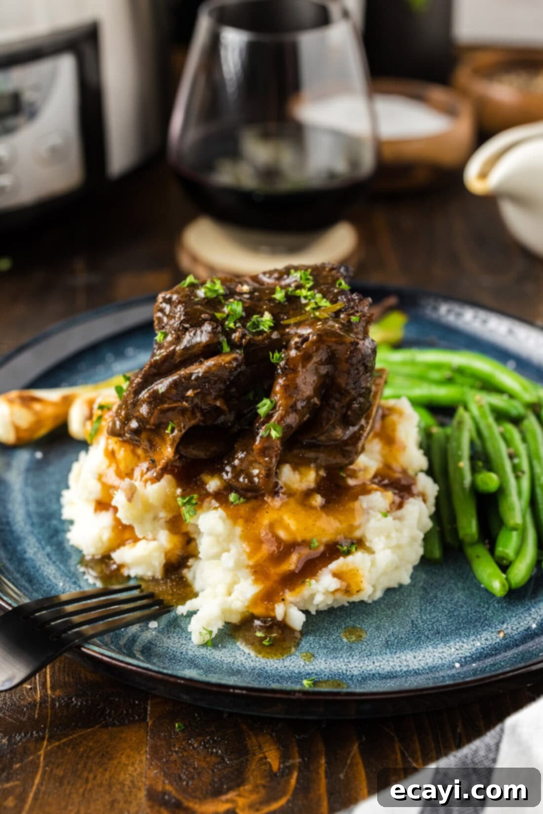 Rich & Tender Slow Cooker Short Ribs 2 Crockpot Beef Short Rib on top of mashed potatoes