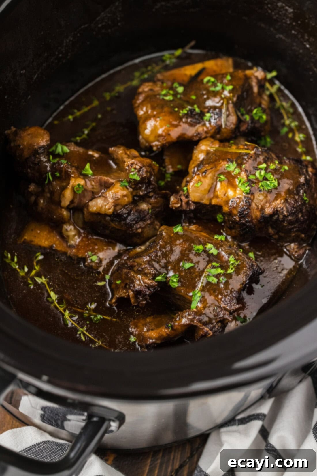 Rich & Tender Slow Cooker Short Ribs 10 Close up photo of Crockpot Beef Short Ribs in a Crockpot