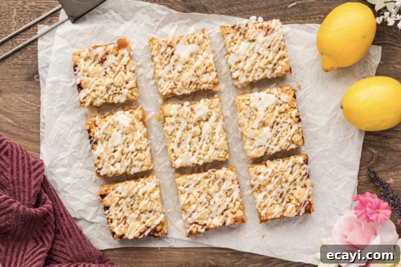 Zesty Lemon Crumble Bars 12 Lemon Streusel Squares neatly cut into 9 squares, ready for serving, showcasing the perfect layered structure and lemon glaze.