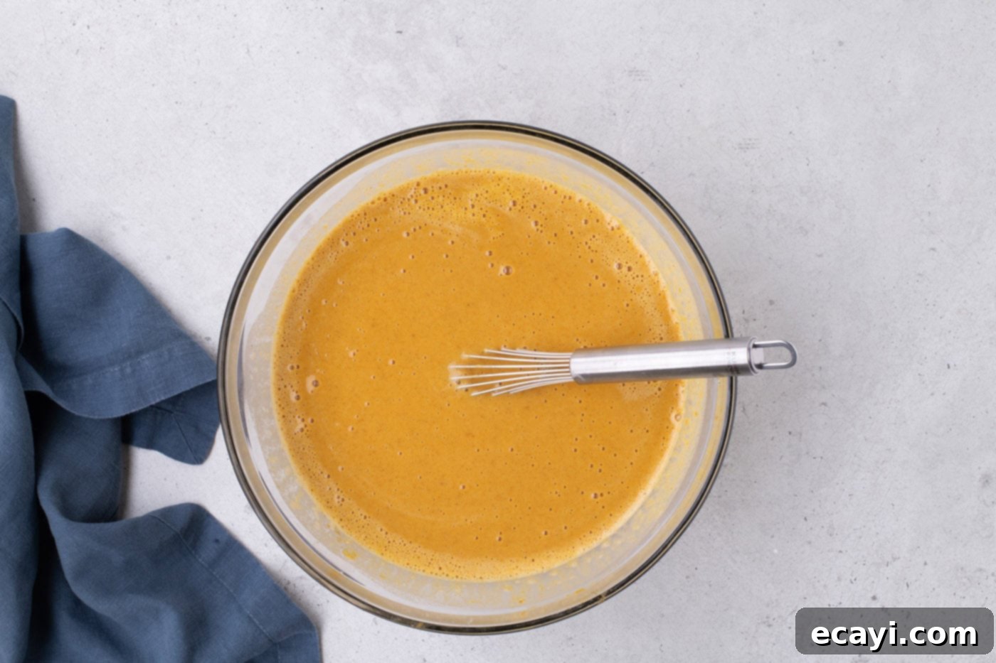 Family Sized Sheet Pan Pumpkin Pie 13 whisked pumpkin pie filling in a bowl